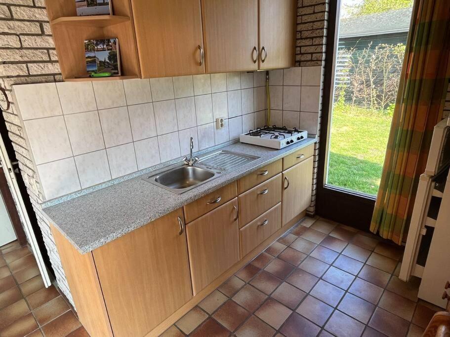 Knusse Bungalow Op Groen Park! Ауддорп Экстерьер фото